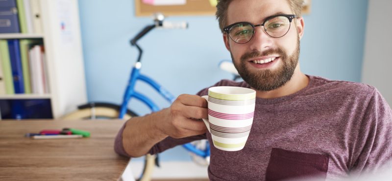 Busy man in modern room